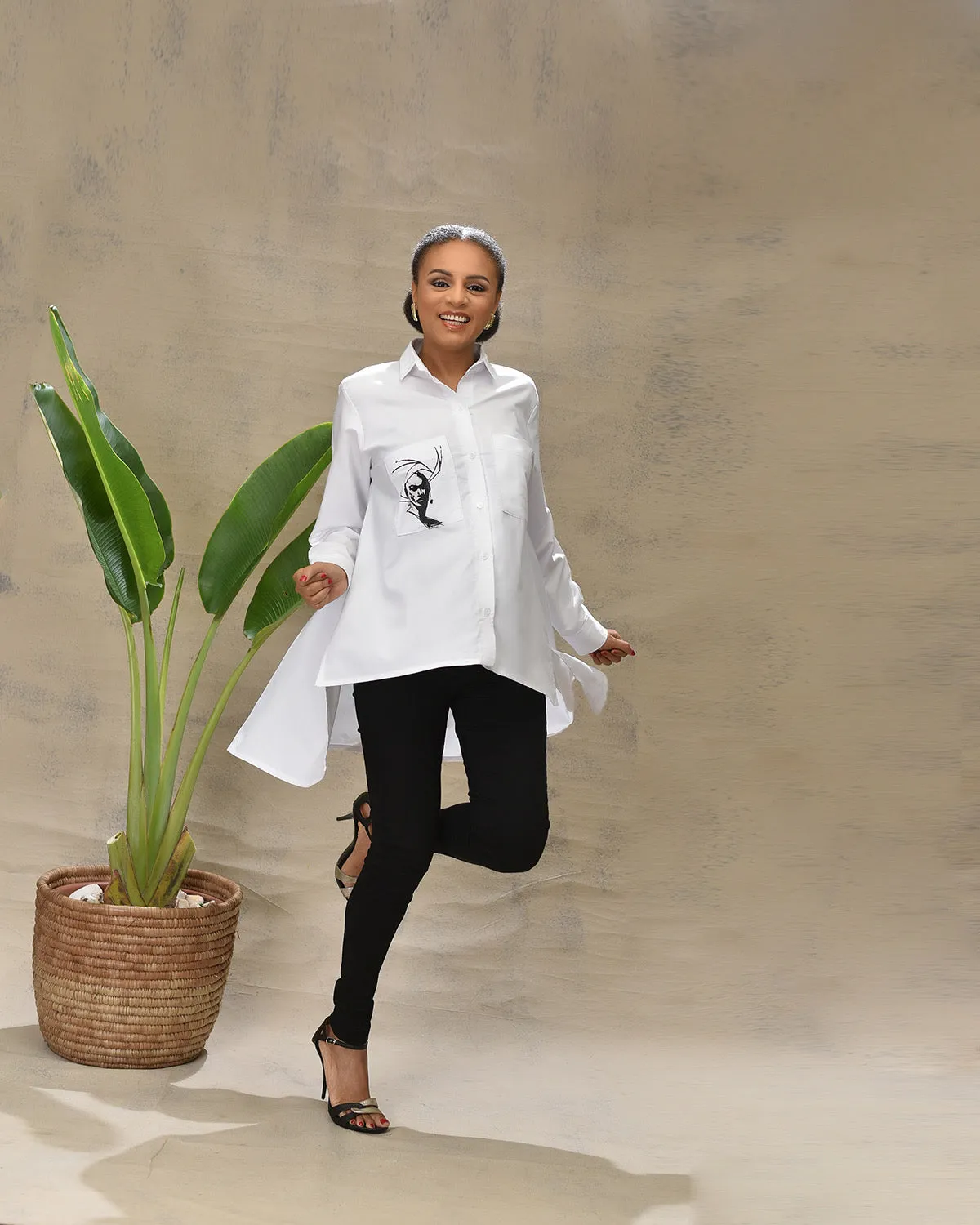 Aimas Iyalaje white Shirt with pocket detail and woman image